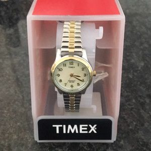 Timex Classic Ladies gold and silver colored watch with indigo night light